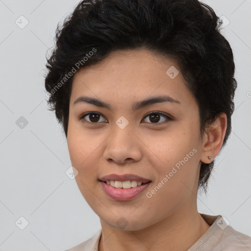 Joyful latino young-adult female with short  brown hair and brown eyes