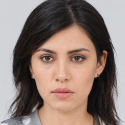 Neutral asian young-adult female with medium  brown hair and brown eyes