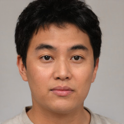 Neutral asian young-adult male with short  brown hair and brown eyes