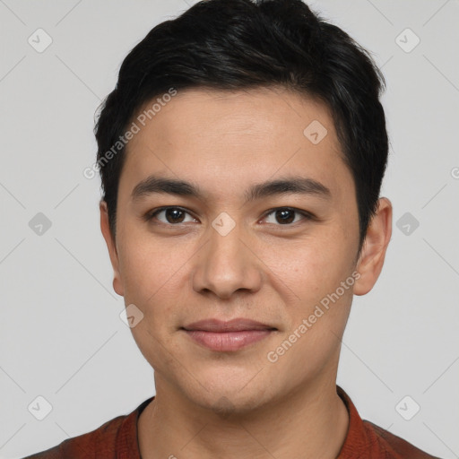 Joyful white young-adult male with short  black hair and brown eyes