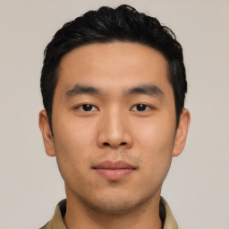 Neutral asian young-adult male with short  black hair and brown eyes