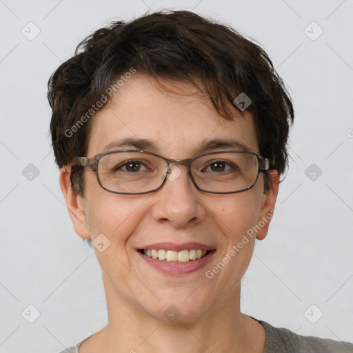 Joyful white adult female with short  brown hair and brown eyes