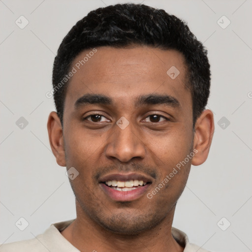 Joyful black young-adult male with short  black hair and brown eyes