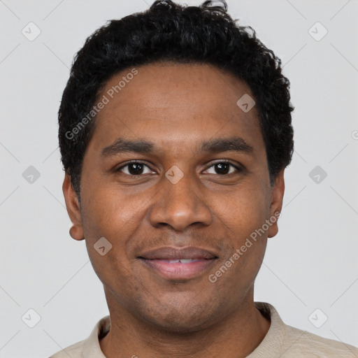 Joyful black young-adult male with short  black hair and brown eyes