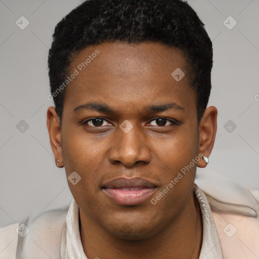 Joyful black young-adult male with short  black hair and brown eyes