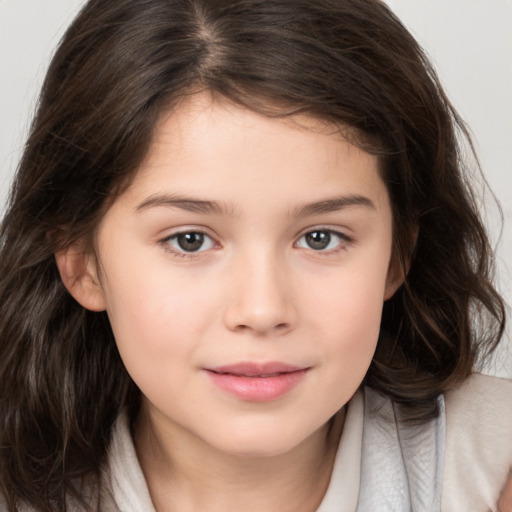 Joyful white child female with medium  brown hair and brown eyes