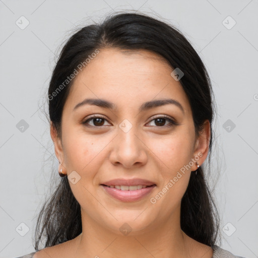 Joyful latino young-adult female with medium  brown hair and brown eyes