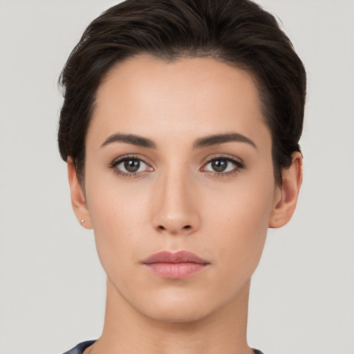 Neutral white young-adult female with short  brown hair and brown eyes