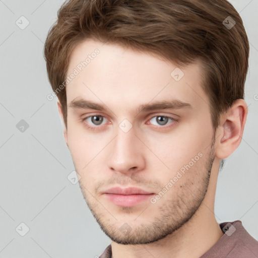 Neutral white young-adult male with short  brown hair and grey eyes