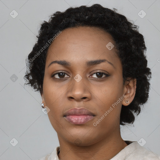 Neutral black young-adult female with short  black hair and brown eyes