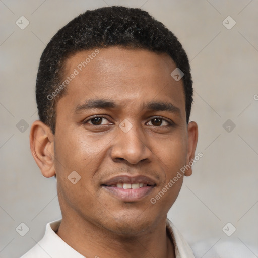 Joyful latino young-adult male with short  brown hair and brown eyes