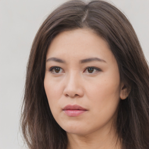 Neutral asian young-adult female with long  brown hair and brown eyes