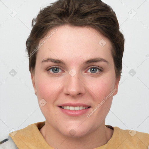 Joyful white young-adult female with short  brown hair and grey eyes