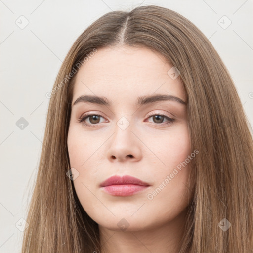 Neutral white young-adult female with long  brown hair and brown eyes