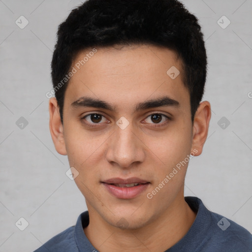 Joyful white young-adult male with short  black hair and brown eyes