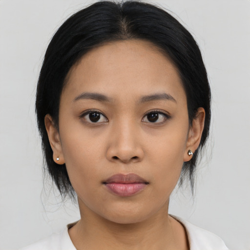 Neutral asian young-adult female with medium  black hair and brown eyes