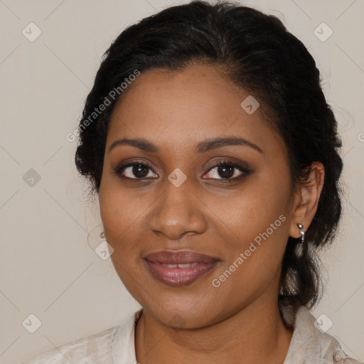 Joyful black young-adult female with medium  brown hair and brown eyes