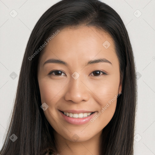 Joyful asian young-adult female with long  brown hair and brown eyes