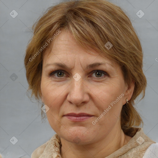 Joyful white adult female with medium  brown hair and brown eyes