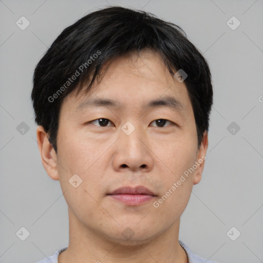 Neutral asian young-adult male with short  black hair and brown eyes