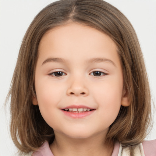 Joyful white child female with medium  brown hair and brown eyes