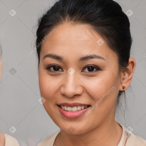 Joyful white young-adult female with medium  brown hair and brown eyes