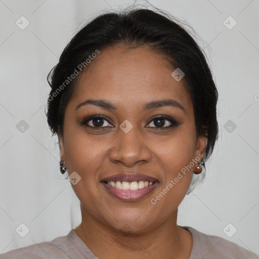 Joyful black young-adult female with medium  brown hair and brown eyes