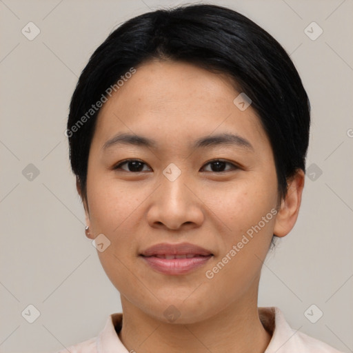 Joyful asian young-adult female with short  black hair and brown eyes