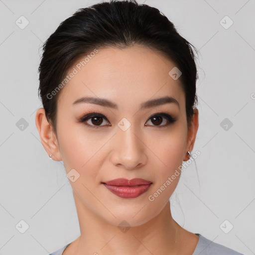 Joyful white young-adult female with medium  black hair and brown eyes