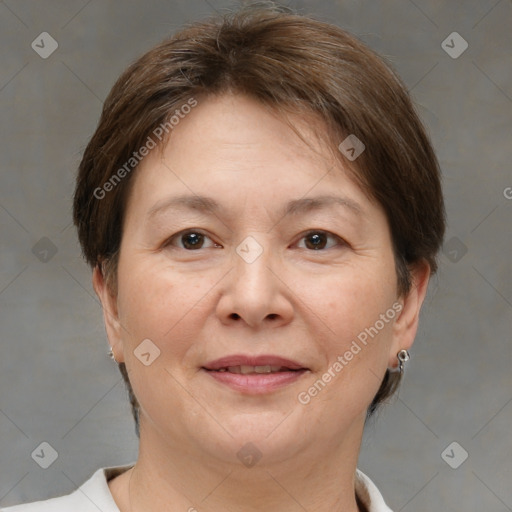 Joyful white adult female with short  brown hair and brown eyes