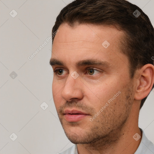 Neutral white young-adult male with short  brown hair and brown eyes