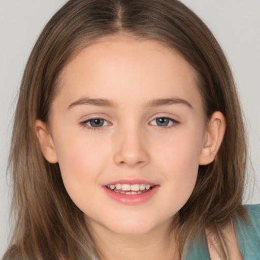 Joyful white child female with long  brown hair and brown eyes