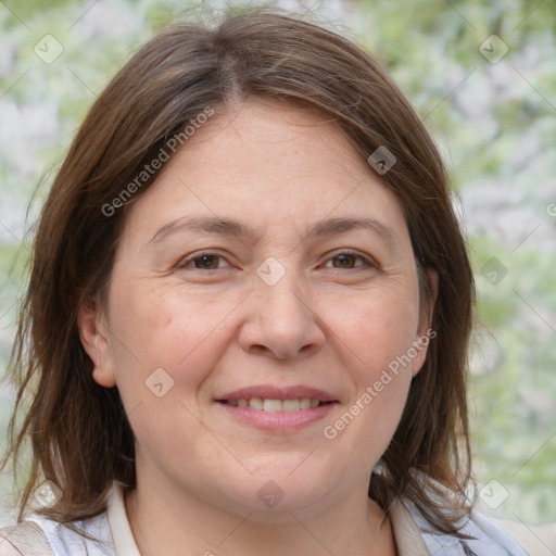 Joyful white adult female with medium  brown hair and brown eyes