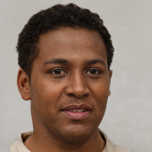 Neutral latino young-adult male with short  brown hair and brown eyes