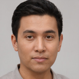 Neutral asian young-adult male with short  brown hair and brown eyes