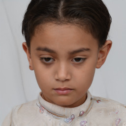 Neutral white child female with short  brown hair and brown eyes