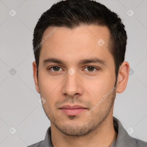 Neutral white young-adult male with short  brown hair and brown eyes