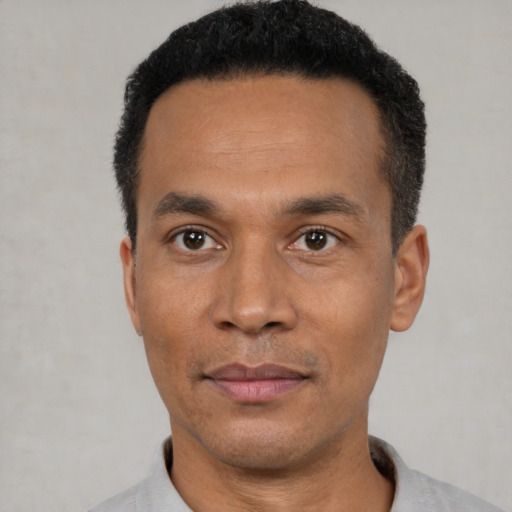 Neutral latino adult male with short  black hair and brown eyes