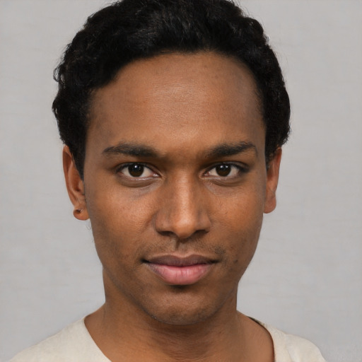 Neutral black young-adult male with short  black hair and brown eyes