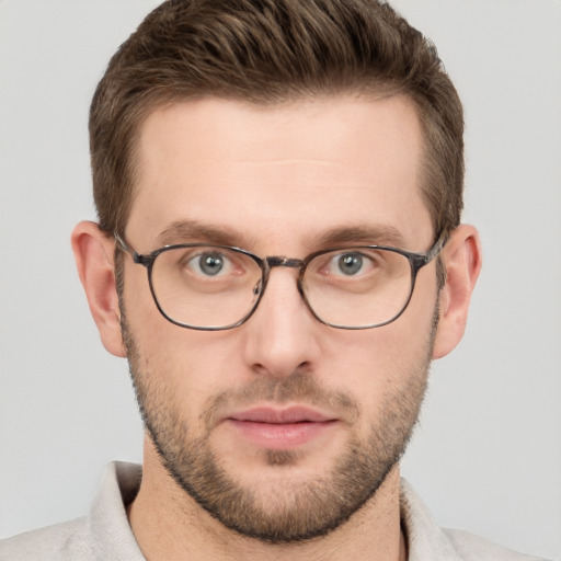 Neutral white young-adult male with short  brown hair and grey eyes