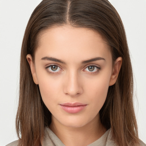 Neutral white young-adult female with long  brown hair and brown eyes