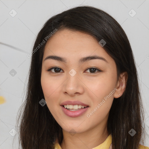 Joyful asian young-adult female with long  brown hair and brown eyes