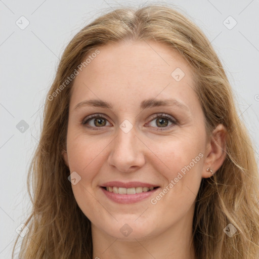 Joyful white young-adult female with long  brown hair and green eyes