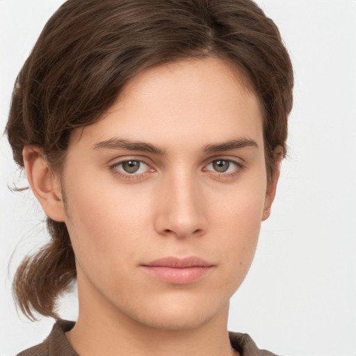 Neutral white young-adult female with short  brown hair and grey eyes