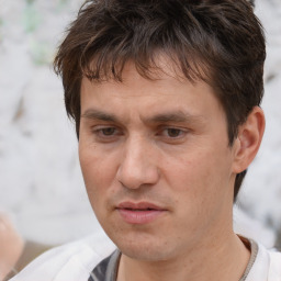 Neutral white adult male with short  brown hair and brown eyes