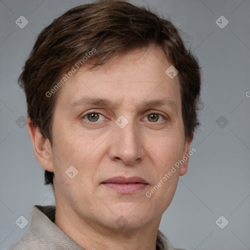 Joyful white adult male with short  brown hair and grey eyes