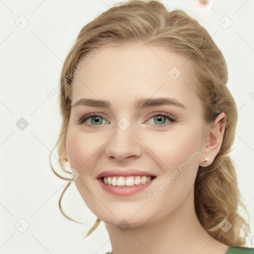 Joyful white young-adult female with medium  brown hair and green eyes