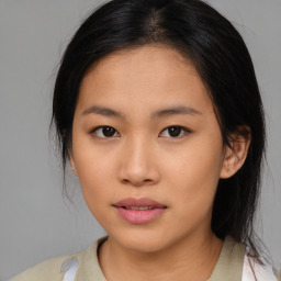 Neutral asian young-adult female with medium  brown hair and brown eyes