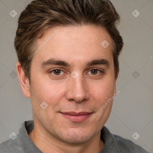 Joyful white adult male with short  brown hair and grey eyes