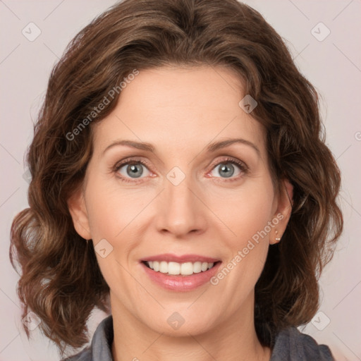 Joyful white young-adult female with medium  brown hair and green eyes